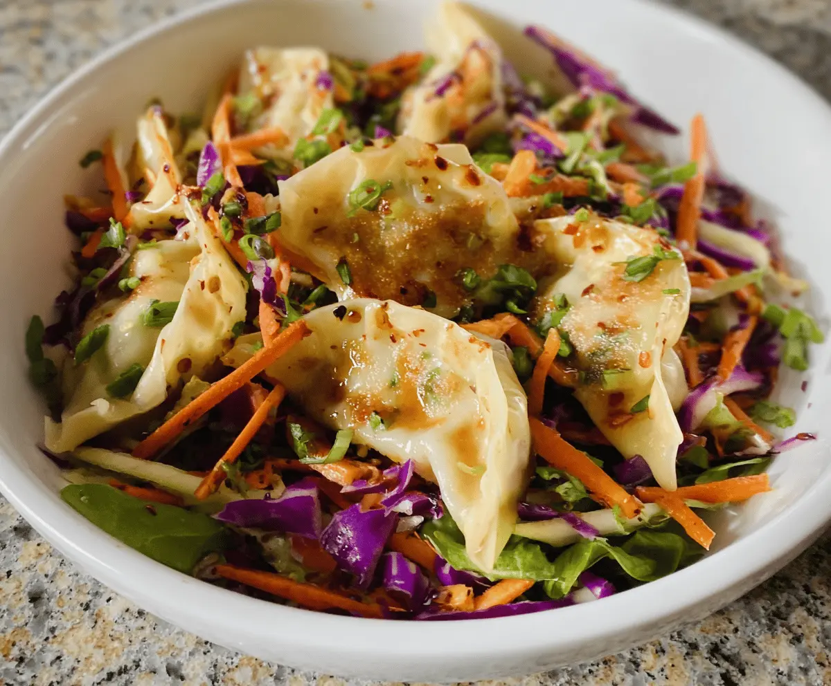Fresh potsticker salad with crispy dumplings, mixed greens, and Asian-inspired dressing, perfect for a flavorful appetizer or main dish.