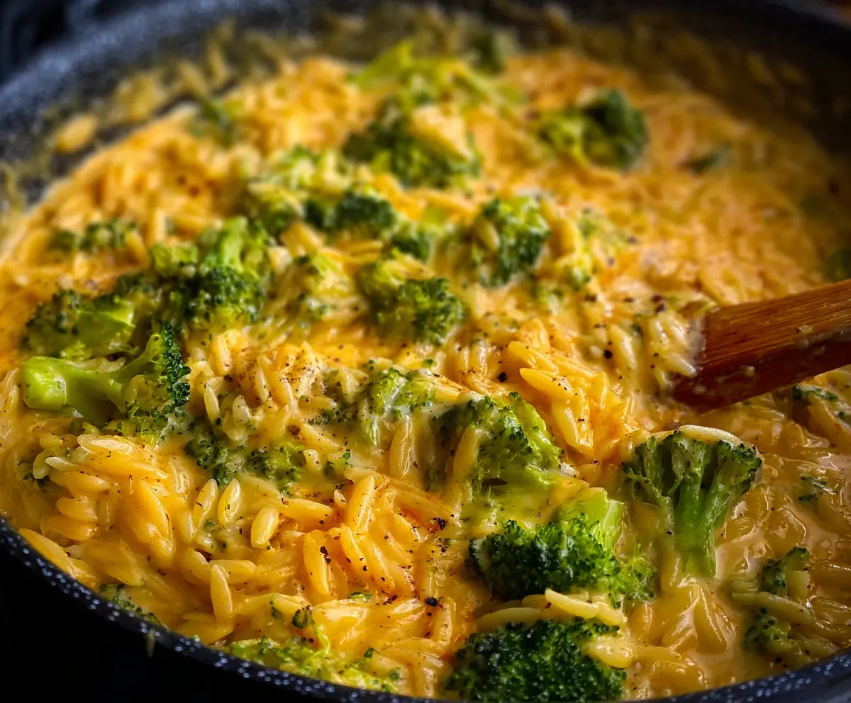 Delicious creamy one-pot broccoli cheddar orzo served in a bowl, perfect for cozy dinners.