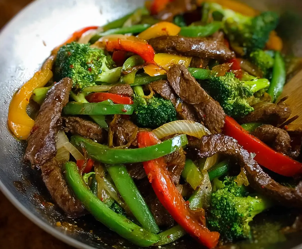 Delicious easy beef stir fry with colorful vegetables served on a plate.